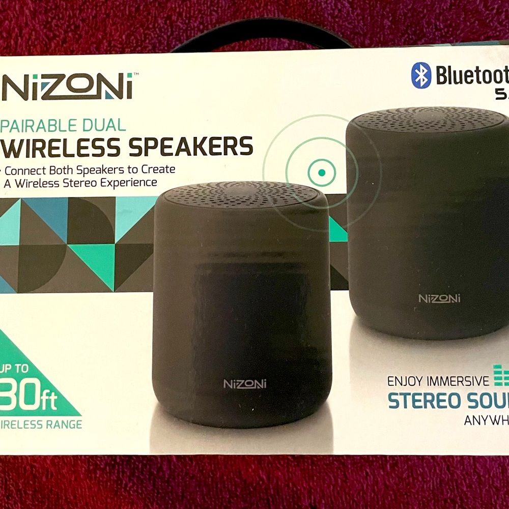 Nizoni pairable dual wireless speaker. Brand new, in box. Two speakers in box.